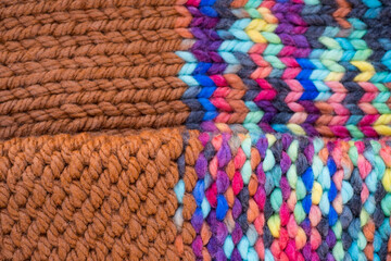 Pattern fabric made of wool. Handmade knitted fabric