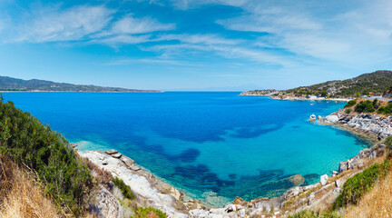 Summer sea scenery with aquamarine transparent water. View from shore (Sithonia, Halkidiki, Greece).