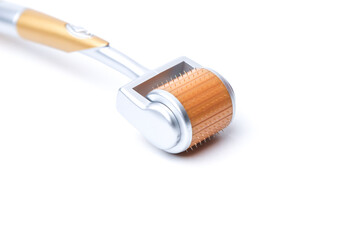 Beauty treatment, mesotherapy or medical collagen production stimulation and black derma roller isolated on white background
