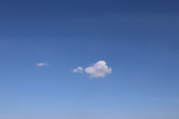 Little clouds with blue sky background