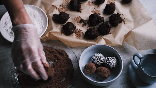 Homemade cream cheese and dark chocolate truffles rolled in cocoa powder
