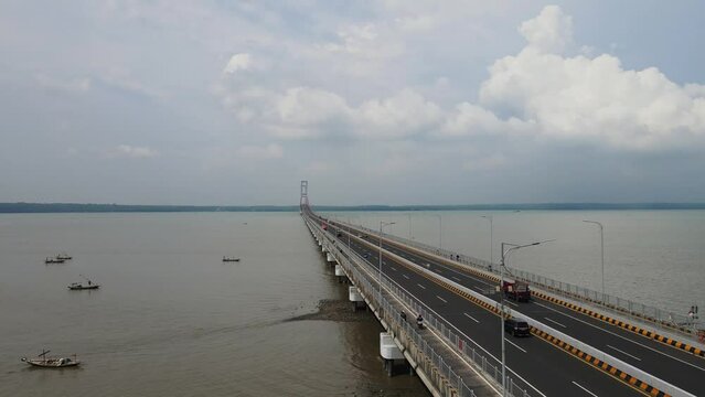 Aerial view of Suramadu bridge, a bridge that connected Surabaya city in Java Island with Bangkalan City in Madura Island.  The bridge located in East Java Province, Indonesia.