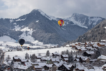 snow covered mountains, hot air balloon in the mountains