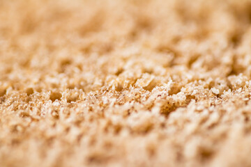 The flesh of fresh bread. Macro background. 