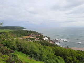 Fototapeta na wymiar green landscape with coast of the sea. green coastline in Goa.