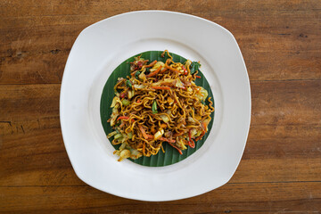 Top down view of Balinese fried noodles (mie or bami goreng), vegetarian