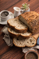 Freshly baked wheat bread loaf breakfast table