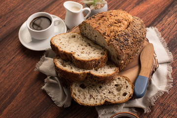 Freshly baked wheat bread loaf breakfast table