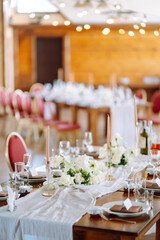 Table set for wedding or another catered event dinner ceremony. Wedding, birthday, party, event concept.