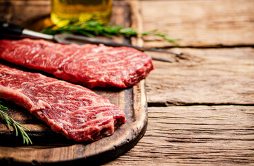 Raw steak on a cutting board. 