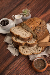 Fototapeta na wymiar Freshly baked wheat bread loaf breakfast table