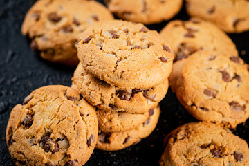 A pile of milk chocolate cookies. 