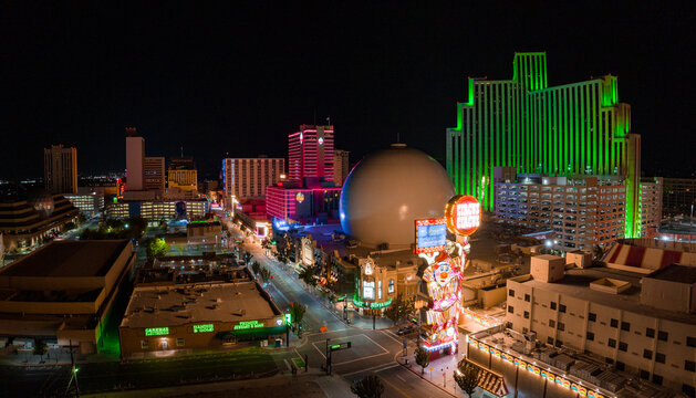 Aerial view of the skyline of Reno Nevada USA at night. City lights, night streets and casinos in Reno, USA.