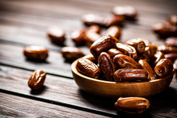 Ripe dates on a plate. 