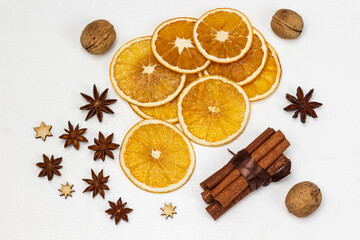Obraz na płótnie Canvas Bundle of cinnamon sticks. Orange chips and star anise.