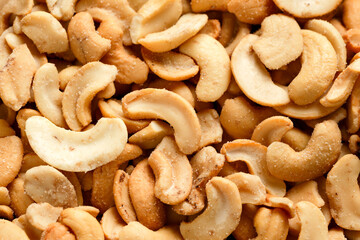 Tasty cashew salted nuts, background. Healthy food