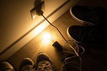 a light bulb with the cord lit.