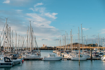 boats in the port with lighthouse at the end, Howth, Dublin, Ireland