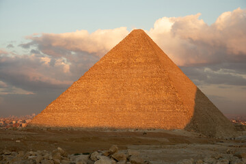 The highest Giza pyramid of Khufu or Cheops in evening light