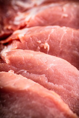 Raw pork. Macro background. The texture of the meat.