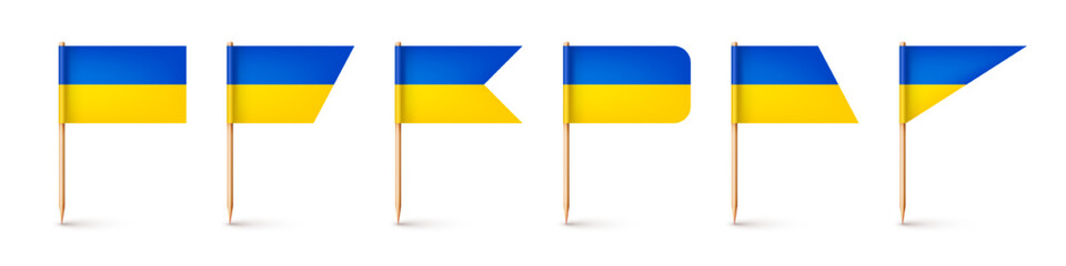 Realistic various Ukrainian toothpick flags. Souvenir from Ukraine. Wooden toothpicks with paper flag. Location mark, map pointer. Blank mockup for advertising and promotions. Vector illustration