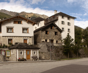 Fototapeta na wymiar Buildings overlooking bus station in Mesocco, Swiss Canton of Grisons