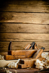 Working tool. Planer with wooden shavings. 