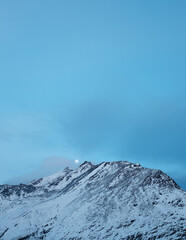 Fototapeta na wymiar Vertical mountain with moon Swiss