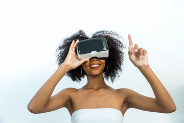 Naklejka premium Woman in VR headset. Happy woman using VR glasses for online game 