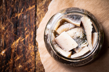 Pieces of pickle herring fillet. 