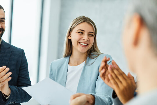 young business people meeting office businesswoman portrait happy smiling applause congratulating teamwork grouphappy smiling success applauding woman
