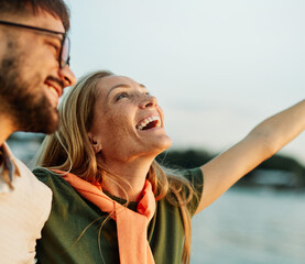 woman outdoor man couple outside happy lifestyle young romance together love summer fun happiness caucasian smiling romantic beautiful dating relationship travel vacation portrait freedom carefree