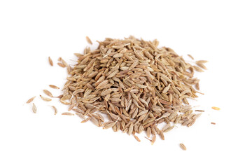 heap of dried cumin isolated on white background