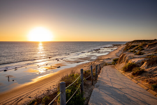 Sunset Time View at Crystal Cove State Beach Shoreline with Ocean Waves, Newport Beach City, California