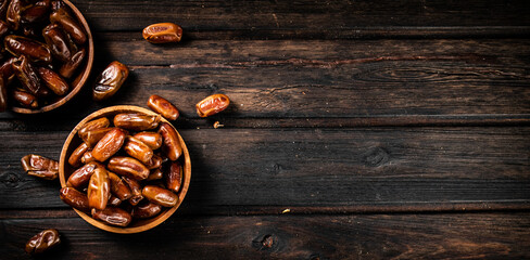 Fresh dates in two plates. 