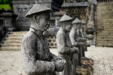  line of Mandarin soldiers stone figures leading pathway to Khai Dinh Tomb in Hue, Vietnam on October 8, 2022