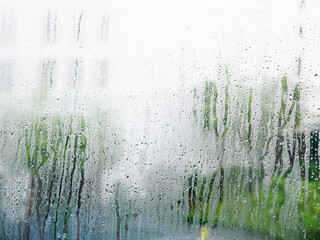 Rain drops and fog background of glass window