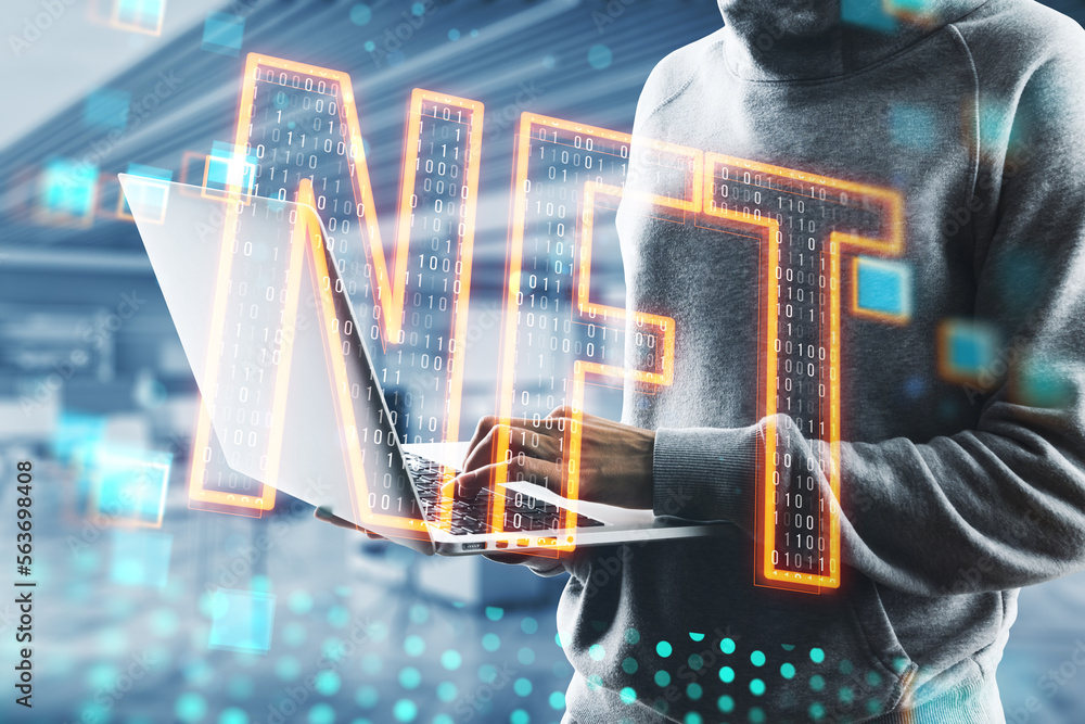 Poster close up of hacker hand using laptop with glowing nft hologram on blurry pixel interior background. 