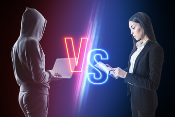 Hacker with laptop versus businesswoman with tablet on blurry dark neon background. Competition,...