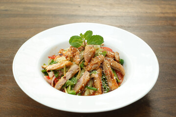 Caesar Salad in a bowl on table,