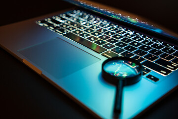 Beautiful colorful laptop keyboard. Modern laptop, isolated on black. Blurred foreground and...