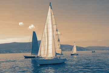 Regatta, sailboats on the water. Montenegro, Bay of Kotor. Toned image