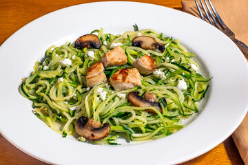 zucchini  noodles top with chicken
