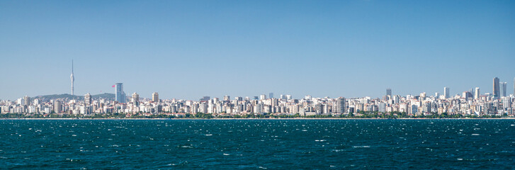 Naklejka premium Panoramic view from the sea and waves to Istanbul in the Sea of Marmara summer sunny day.