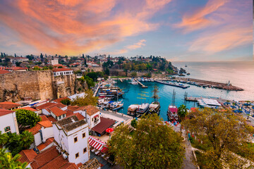 Ships in the old harbour in Antalya (Kaleici), Turkey. Old town of Antalya is a popular Tourist...