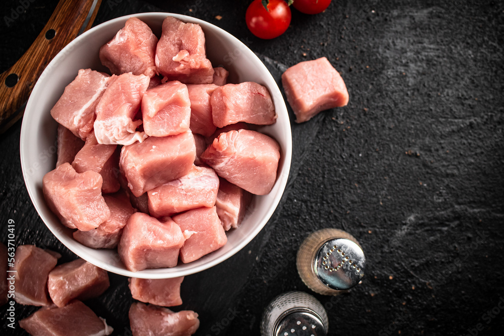 Wall mural chopped raw pork in a bowl.