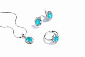 Elegant jewelry set. Jewellery set with gemstones. Jewelry accessories collage. Product still life...