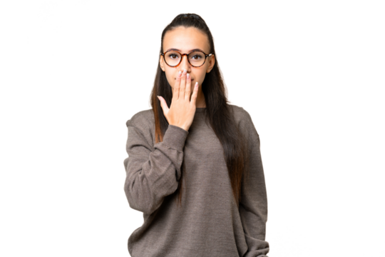 Young Arabian woman over isolated chroma key background covering mouth with hand