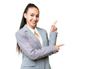Young Arabian woman over isolated chroma key background pointing finger to the side and presenting a product