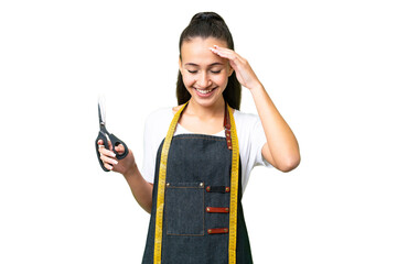 Young Seamstress woman over isolated chroma key background laughing